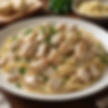 A plate of creamy chicken Alfredo pasta adorned with parsley