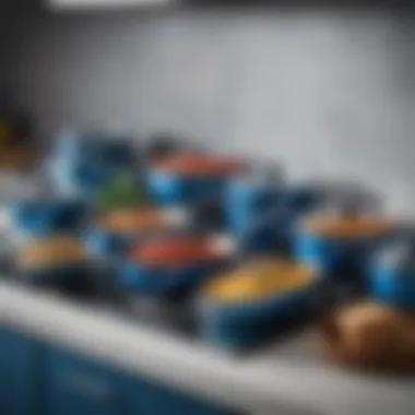 Diverse blue diamond pots and pans arranged on a kitchen countertop