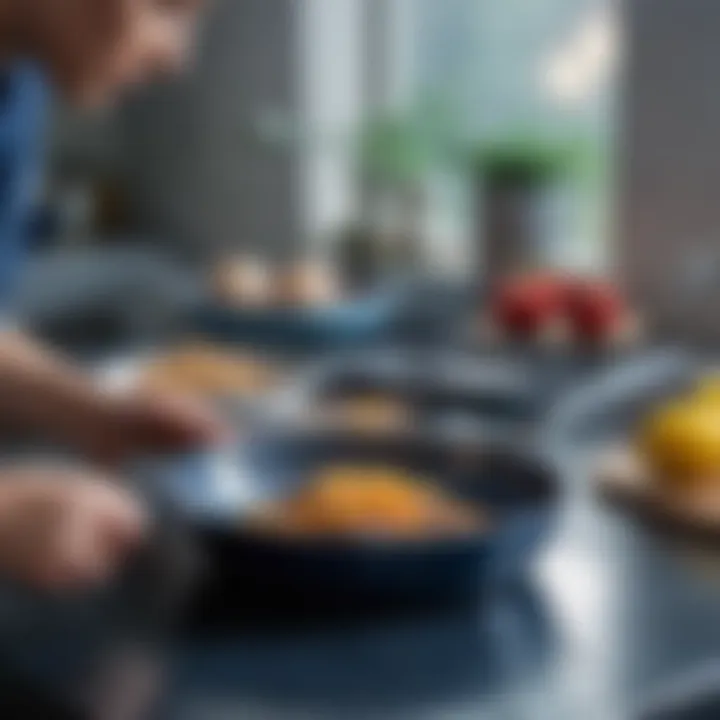 A person demonstrating the easy cleaning of blue diamond cookware after use