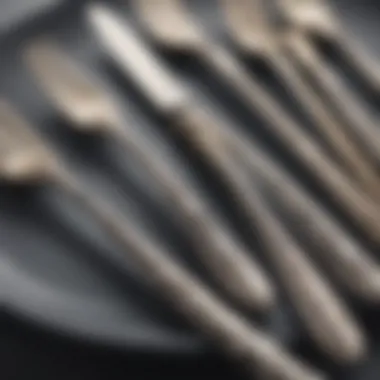 Close-up of intricate silverware designs showcasing craftsmanship