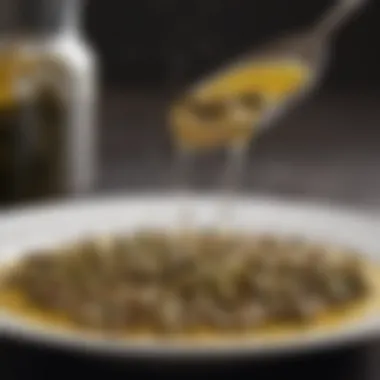 A close-up of caper brine being drizzled over a gourmet dish