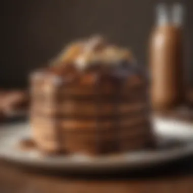 Chocolate protein pancakes stacked and drizzled with syrup