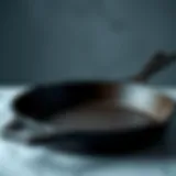 A pristine cast iron skillet showcasing its smooth surface