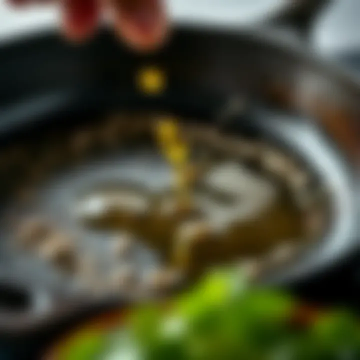Applying Seasoning for Optimal Performance Close-up of seasoning application with oil on an iron skillet
