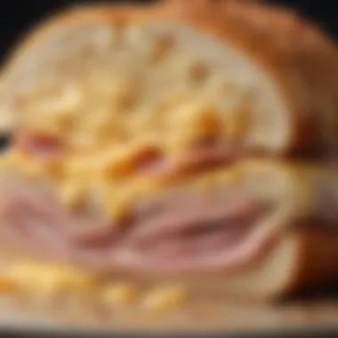 Close-up of the cross-section of chicken cordon bleu revealing ham and cheese filling