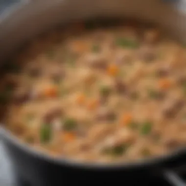 A close-up view of the rice and peas simmering in a pot, showcasing their texture and color.