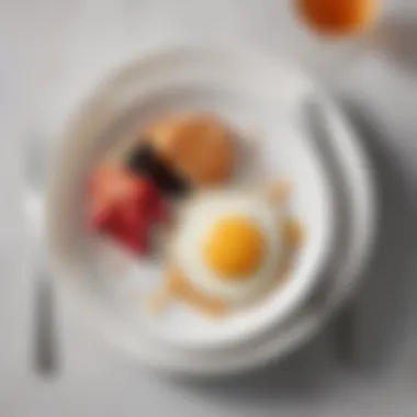 An elegantly arranged breakfast plate featuring a balanced meal.