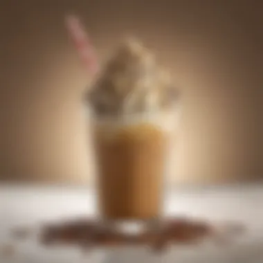 Close-up of a frosty caramel frappuccino garnished with chocolate shavings and a straw