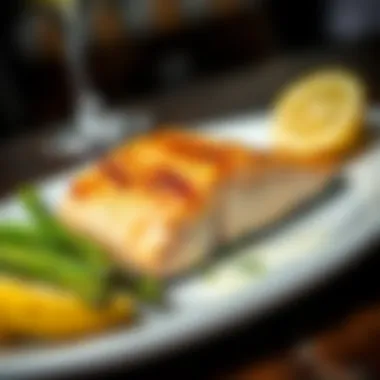 Grilled salmon served with steamed asparagus and lemon