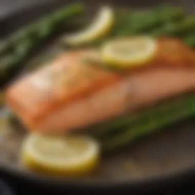 Baked salmon on a bed of steamed asparagus and lemon slices