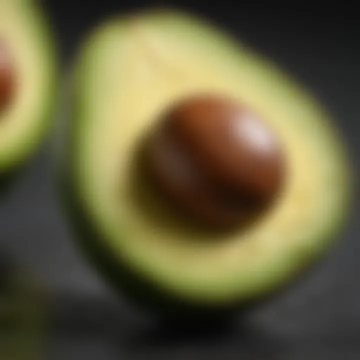 Freshly cut avocado half showing vibrant green flesh