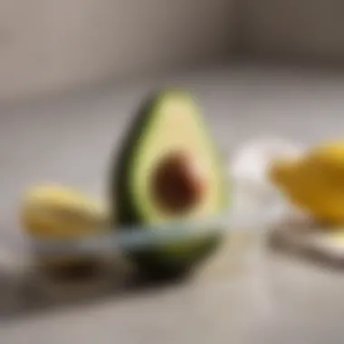 Avocado stored in a glass container with lemon juice