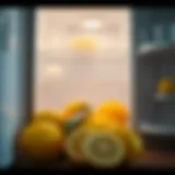 Fresh lemons placed beside an open refrigerator.