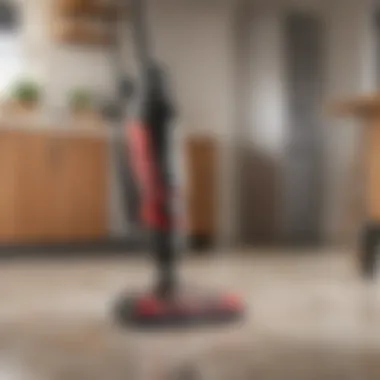 A user showcasing the compact design of a cordless stick vacuum.