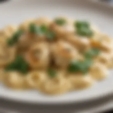 A beautifully plated Chicken Tortellini Alfredo garnished with fresh herbs