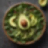 Sliced avocado on a bed of fresh greens with a sprinkle of seeds