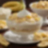 A bowl of creamy banana pudding topped with whipped cream and banana slices