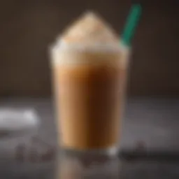 A refreshing cup of iced coffee topped with a light froth and caramel drizzle