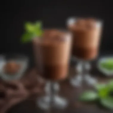 Decadent chocolate mousse presented in elegant glassware with fresh mint