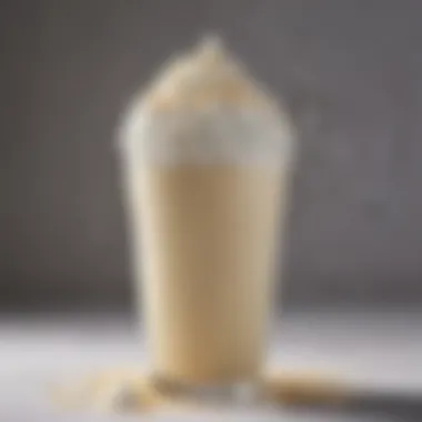 Close-up of McDonald's creamy medium shake topped with whipped cream