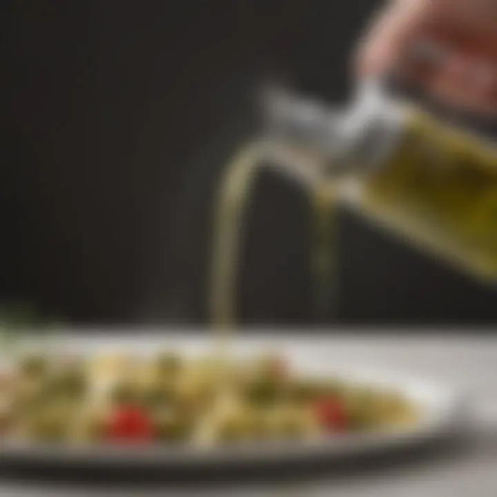 Close-up of a non-aerosol spray nozzle releasing fine mist of olive oil