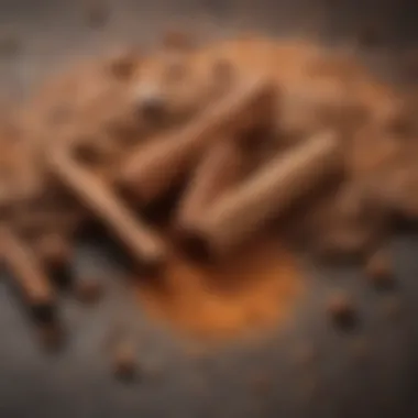 A close-up of ground cinnamon sprinkled over coffee grounds.