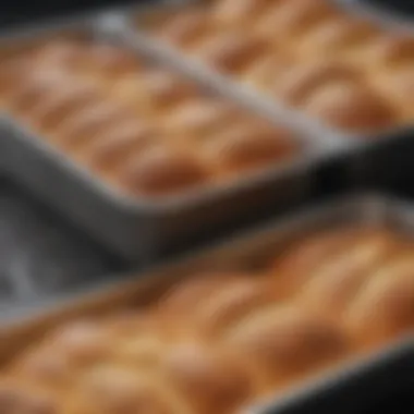 A side-by-side comparison of different designs of loaf pans showcasing their unique features.