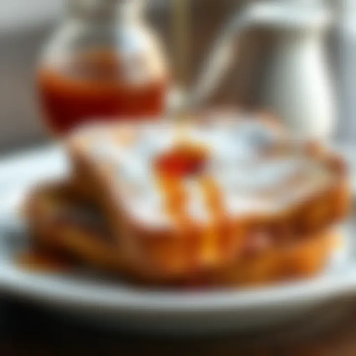 A close-up of French toast drizzled with maple syrup and powdered sugar