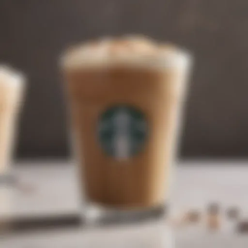 A close-up of a glass filled with Starbucks Oat Milk Shaken Espresso, showcasing its creamy texture and rich espresso color.