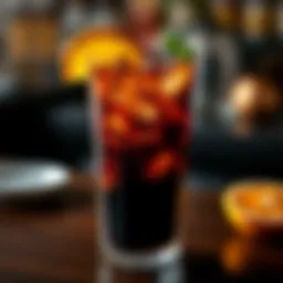 A gin and Coke cocktail elegantly garnished with citrus slices.