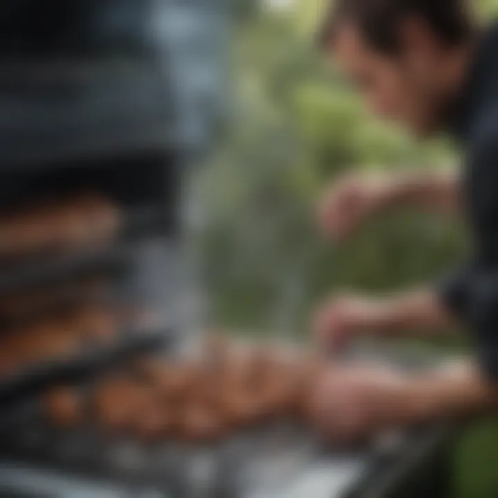 User adjusting the temperature controls of the smoker