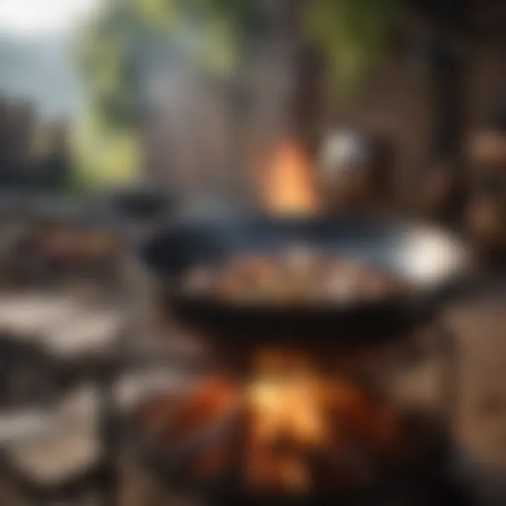 A scenic outdoor setting with a forged iron pan over an open flame