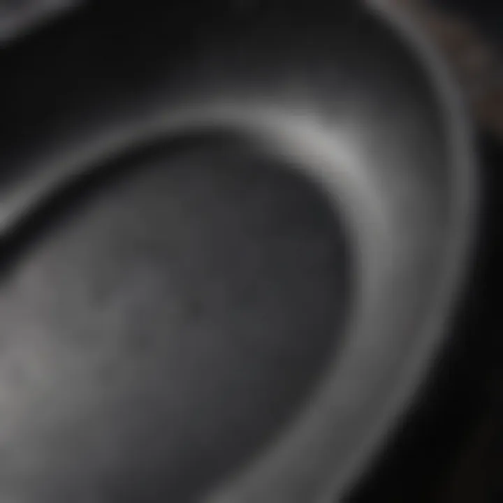 Close-up of the textured surface of a forged iron pan showcasing its durability