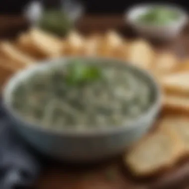 Vibrant bowl of homemade spinach dip garnished with herbs