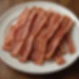 Delicious crispy strips of bacon on a plate