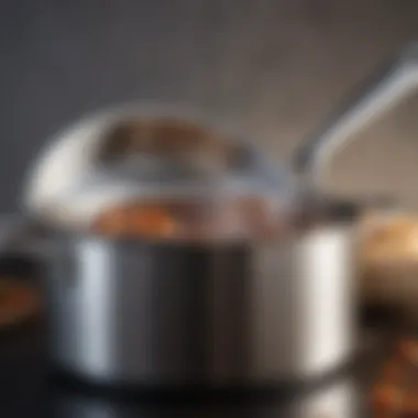 Close-up of a high-quality stainless steel saucepan reflecting light.