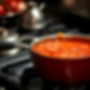 The Art of Simmering Your Sauce A simmering pot of tomato sauce on the stove