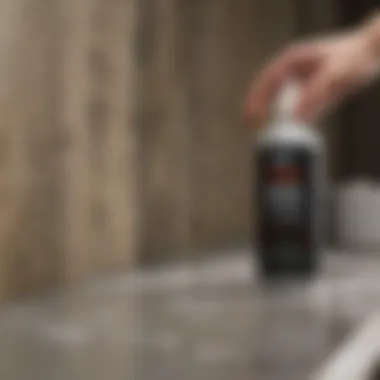 A professional applying a commercial mold treatment product in a home setting, demonstrating effective application techniques.