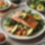 A beautifully arranged plate of grilled salmon with avocado and leafy greens, showcasing keto-friendly dining.