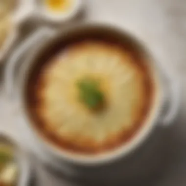 A traditional dish of scalloped potatoes served in an elegant ceramic dish.