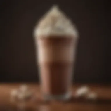 Close-up of a creamy chocolate shake topped with whipped cream.