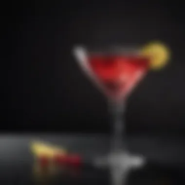 A sophisticated cocktail glass filled with a perfectly crafted cosmopolitan.