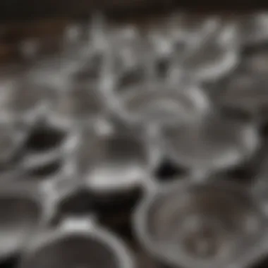 An array of stainless steel strainers in various sizes and shapes