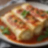 A close-up of beautifully arranged stuffed manicotti on a plate garnished with fresh herbs