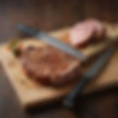 Pork chop resting on a cutting board with a knife