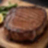 A perfectly grilled ribeye steak with grill marks