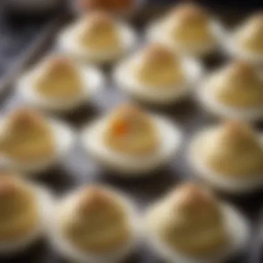 Close-up of creamy filling being piped into egg whites