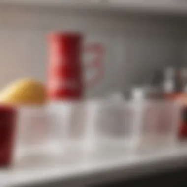 A well-maintained set of wet measuring cups organized neatly on a shelf.