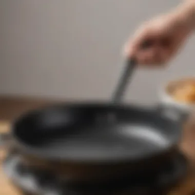 Close-up view of the skillet's smooth enamel finish and ergonomic handle.