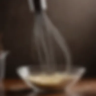 A close-up view of a whisk in action